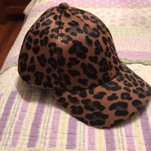 Leopard print snapback cap.